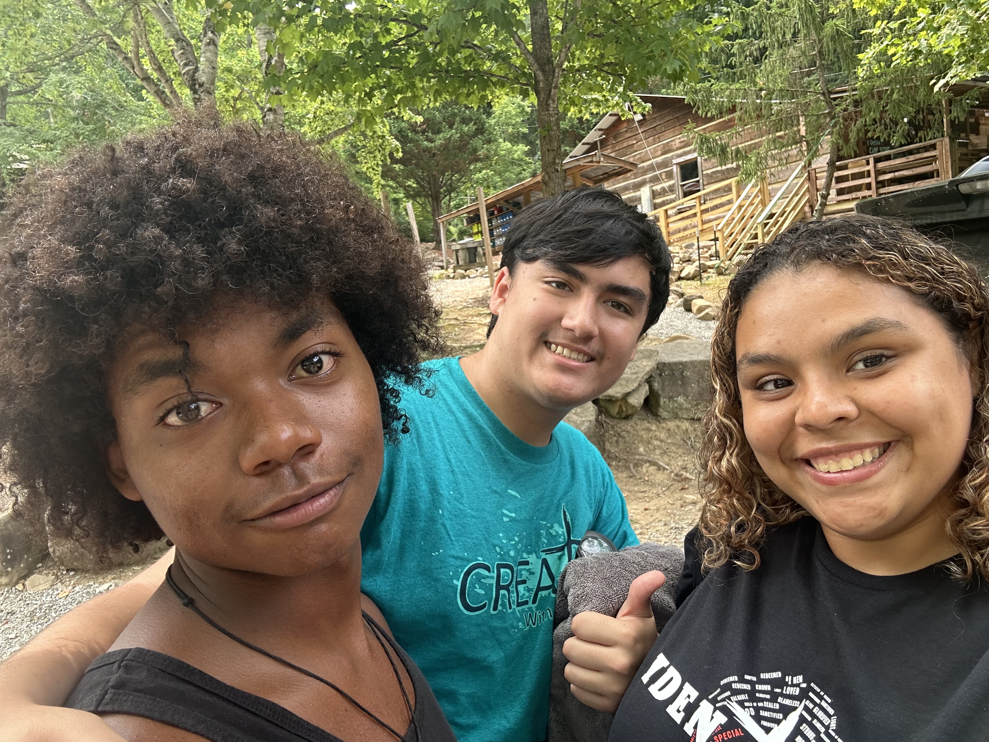 Teens at camp cabin